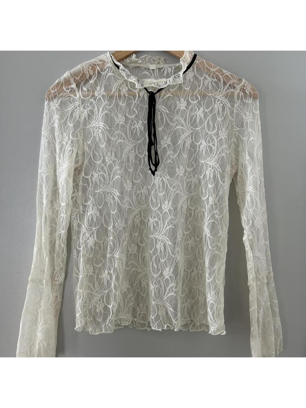 White lace long sleeve top with black ribbon tie